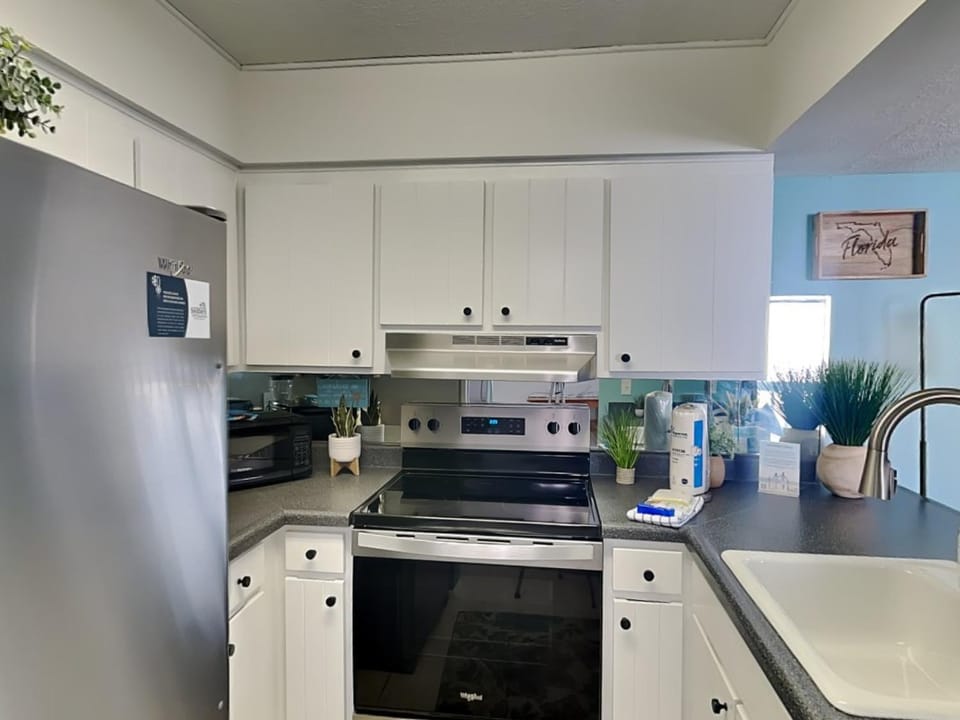 Kitchen or kitchenette, microwave, oven, stove, kitchen
