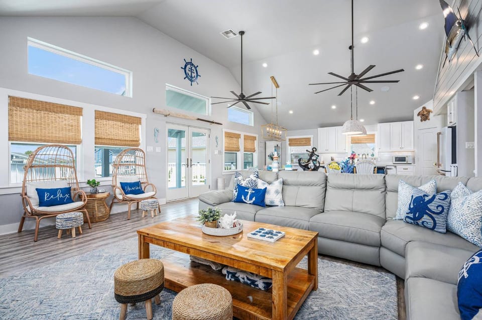 View (from property/room), Living room, Decorative detail, Seating area, Beach, Sea view