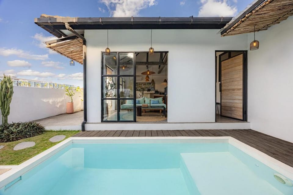 Property building, Patio, Day, Pool view, Swimming pool