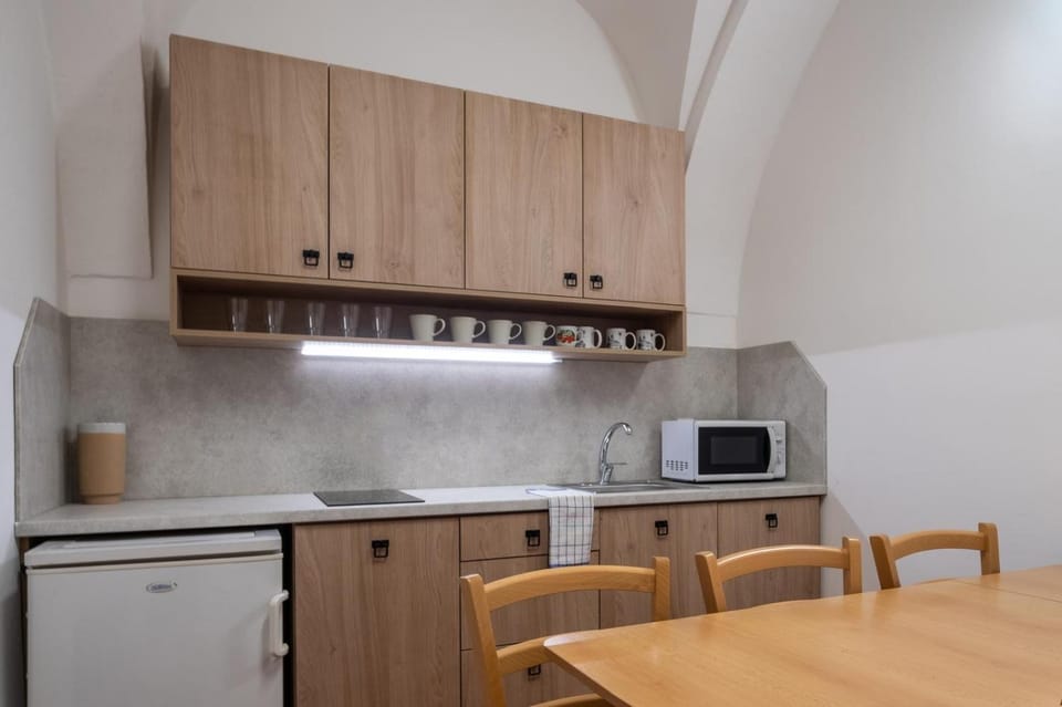 Kitchen or kitchenette, stove
