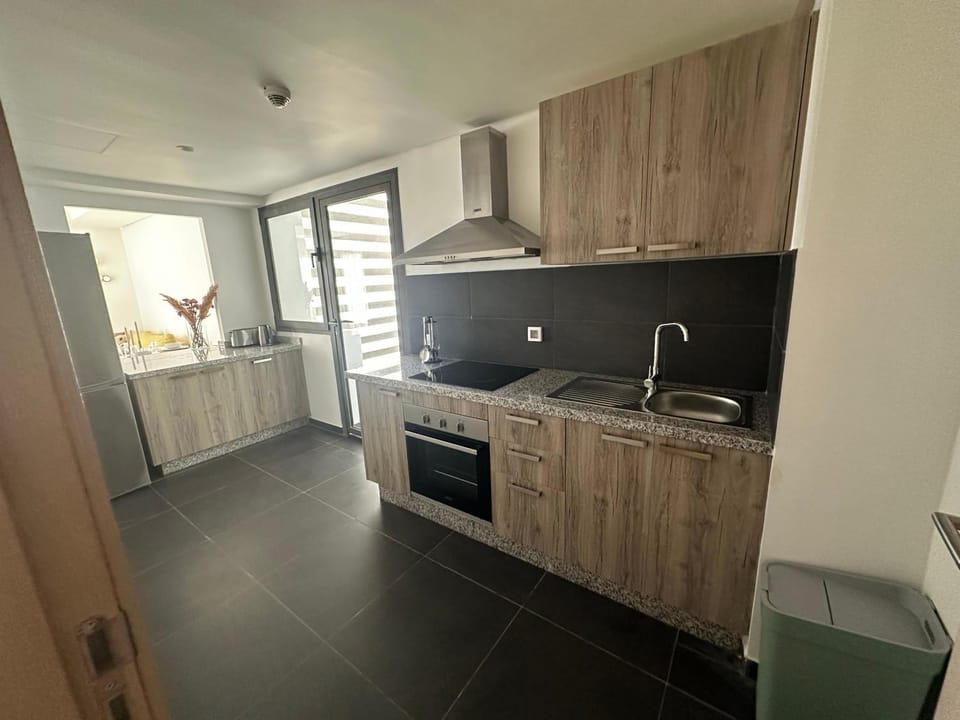 Kitchen or kitchenette, oven, stove