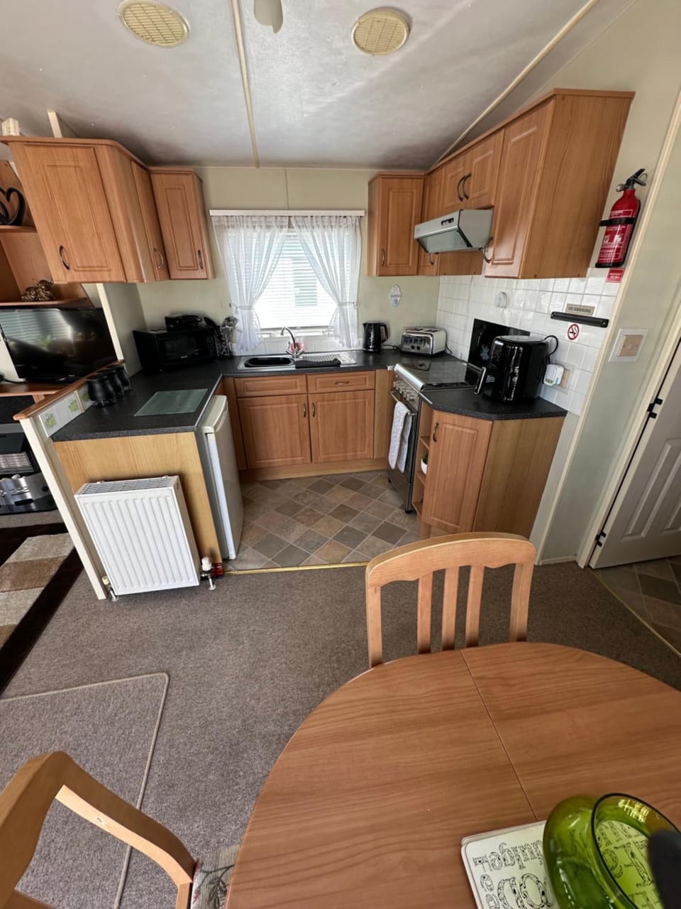 Kitchen or kitchenette, Dining area, oven, stove, toaster