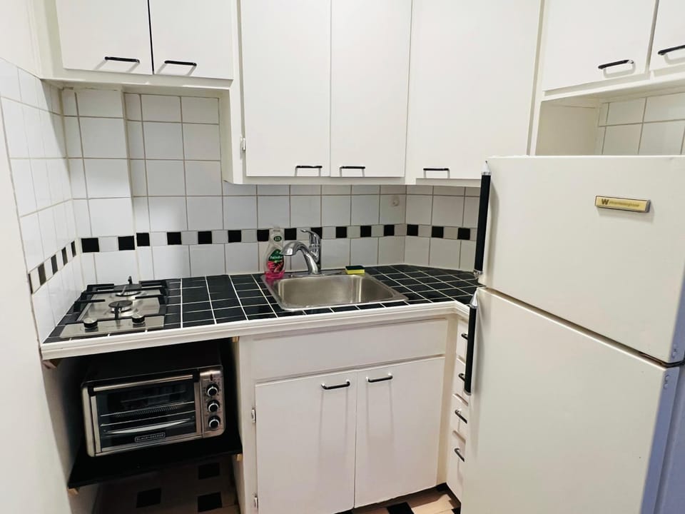 Kitchen or kitchenette, oven, stove