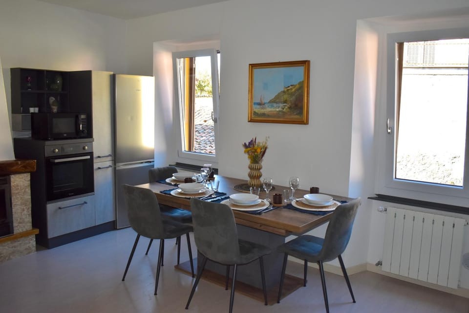 Dining area, microwave, oven, kitchen