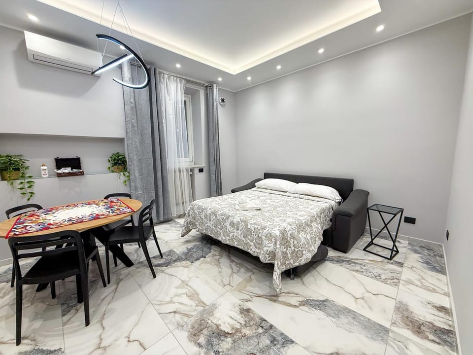 Bed, Living room, Seating area