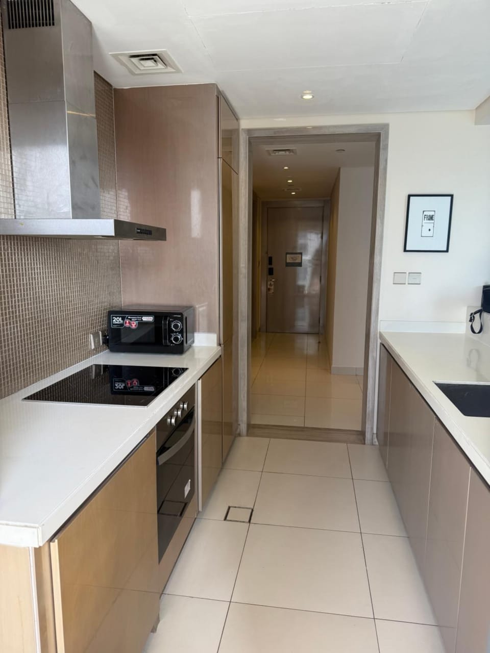 Kitchen or kitchenette, dishwasher, oven