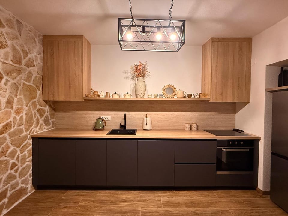 Kitchen or kitchenette, stove