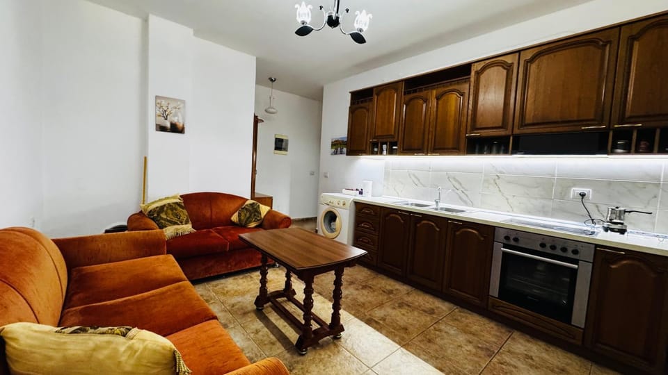 Kitchen or kitchenette, Living room, Seating area, Dining area