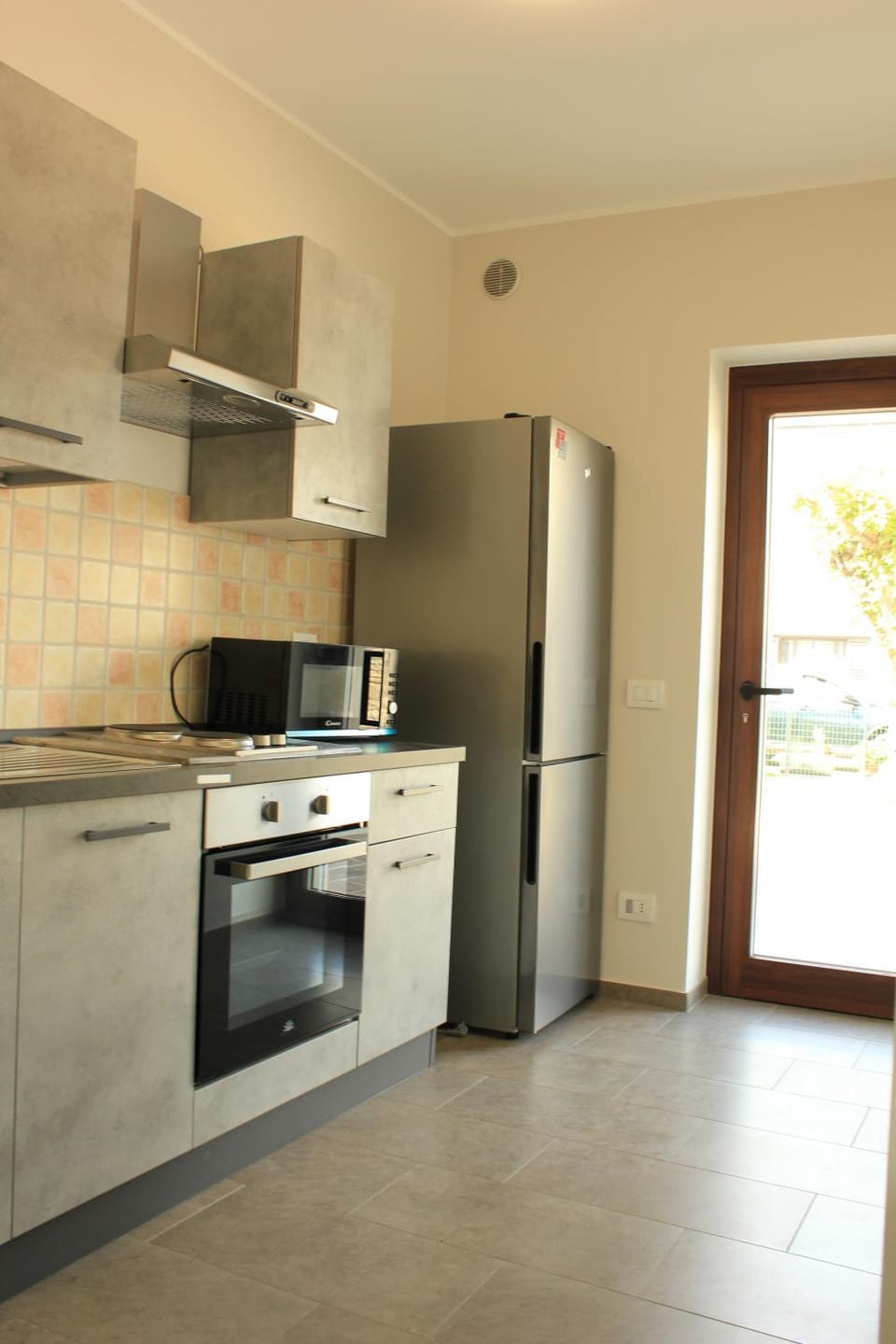 Kitchen or kitchenette, oven