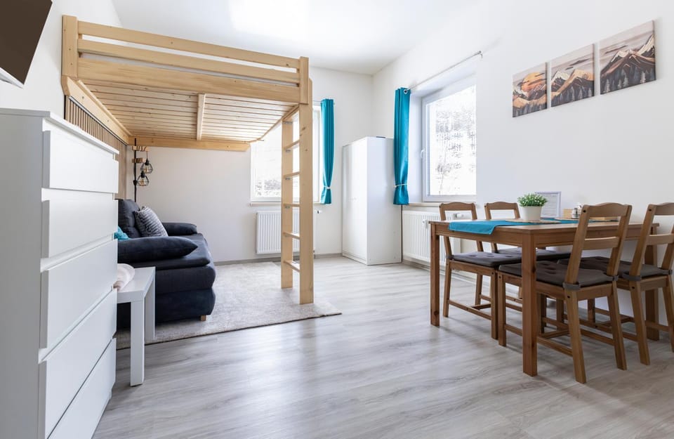 Bed, Living room, Seating area, Dining area