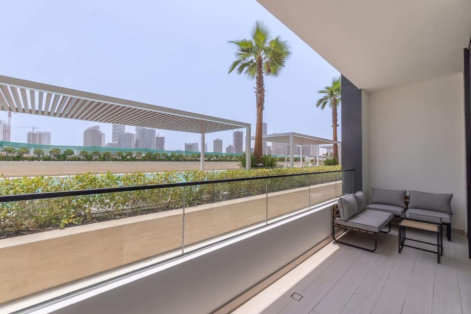 Free housekeeping visits during your stay - StayShort - JVC Apartment Sleeps 4 with Pool View Apartment in Dubai