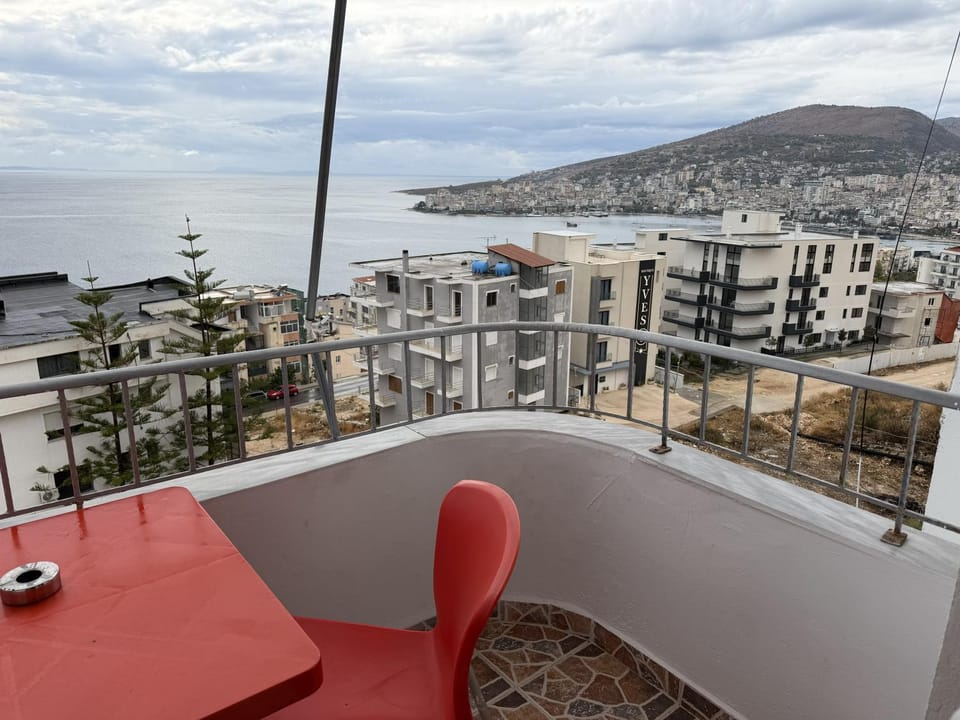 Property building, Patio, Day, Natural landscape, View (from property/room), Balcony/Terrace, Dining area, City view, Mountain view, Sea view