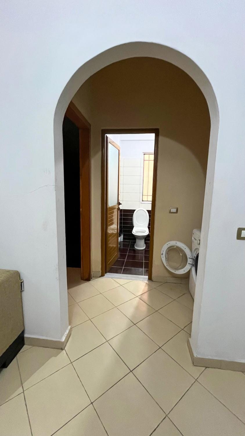 Toilet, Bathroom, Living room, Seating area