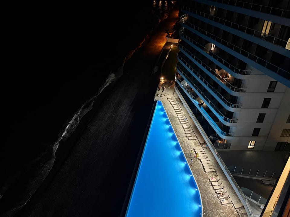 Property building, Night, Beach, Pool view, Swimming pool