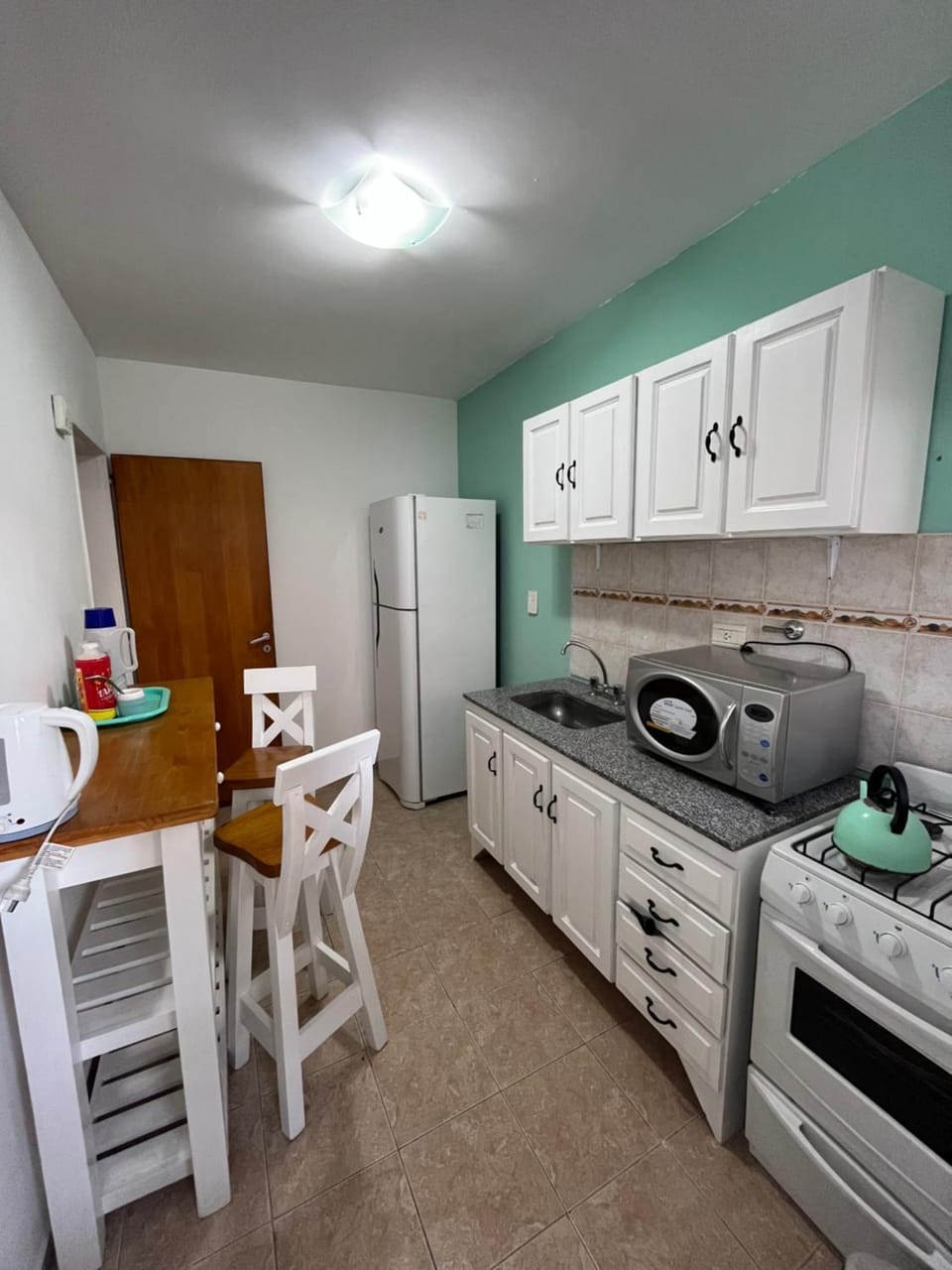 Kitchen or kitchenette, oven