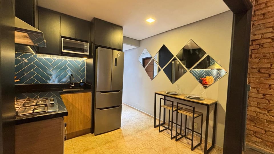 Kitchen or kitchenette, oven, stove