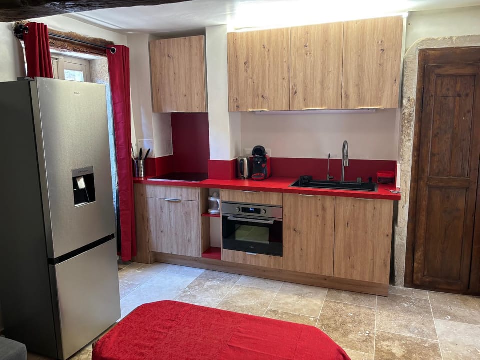 Kitchen or kitchenette, microwave, oven, stove, toaster