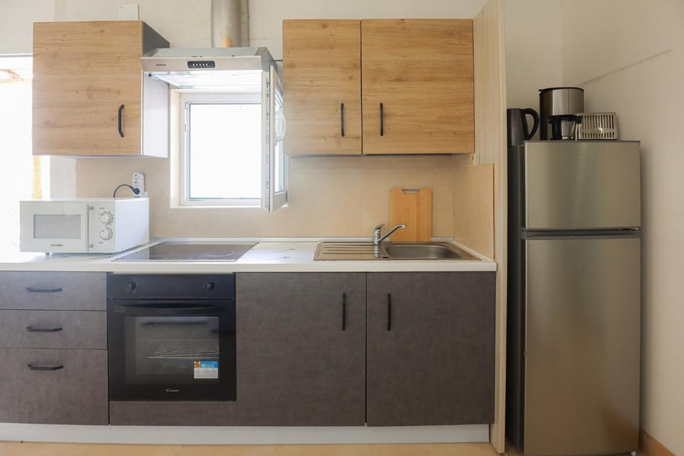 Kitchen or kitchenette, oven, stove, toaster