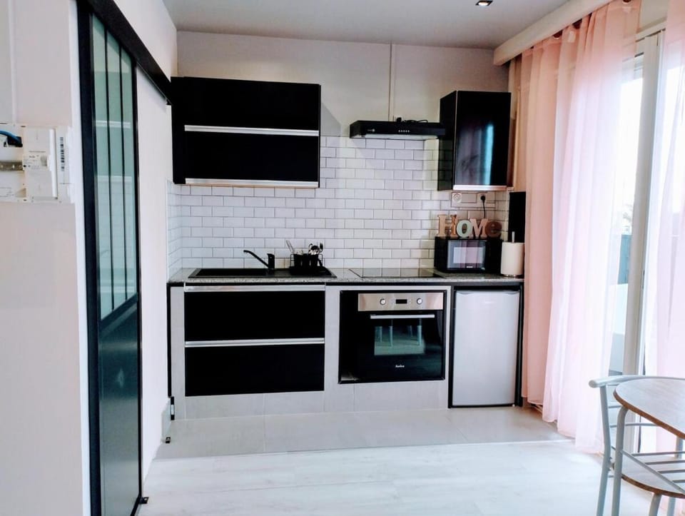 Kitchen or kitchenette, oven, stove, toaster
