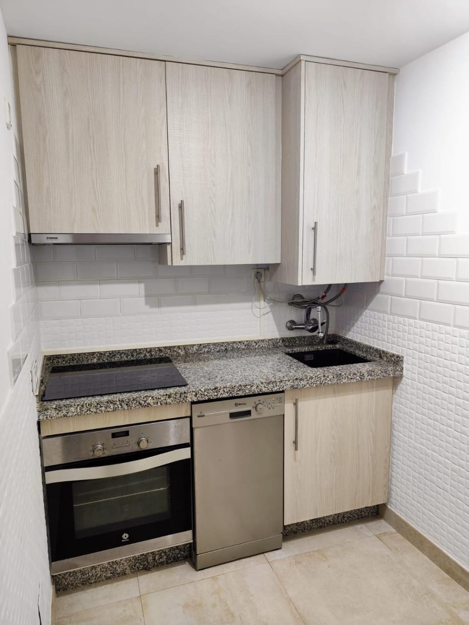 Kitchen or kitchenette, dishwasher, stove