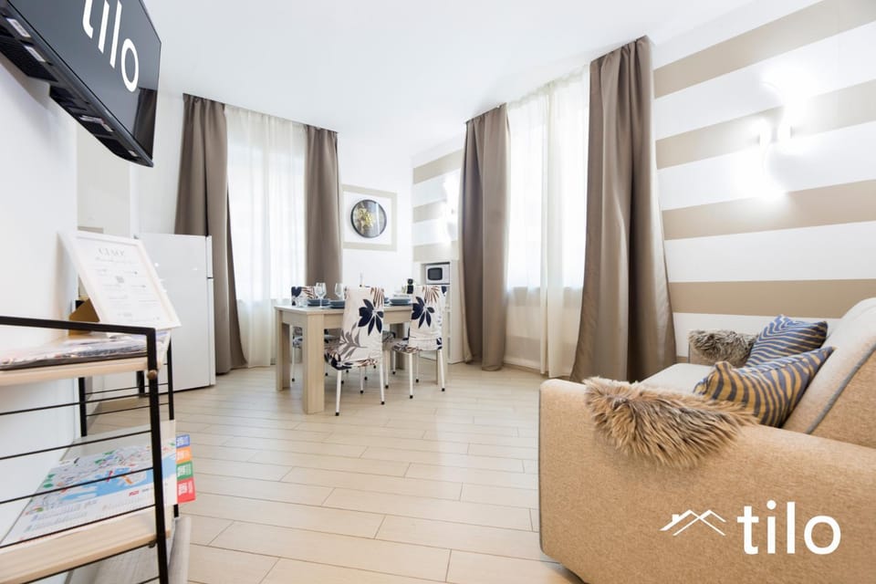 TV and multimedia, Living room, Seating area, Dining area, Text overlay