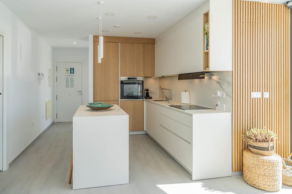 Kitchen or kitchenette, dishwasher, oven, stove
