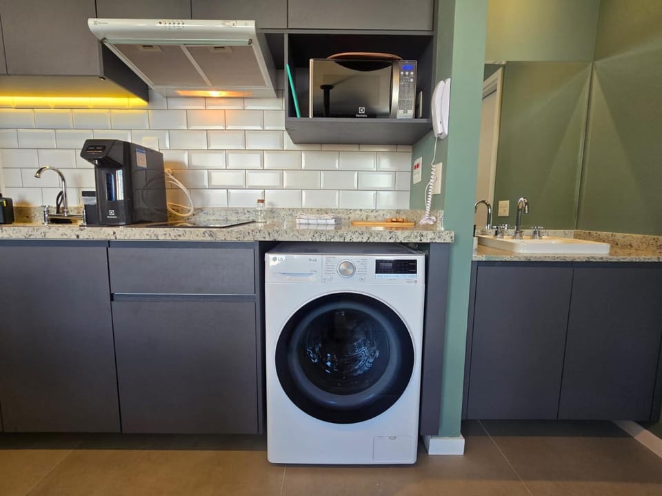Kitchen or kitchenette, washing machine