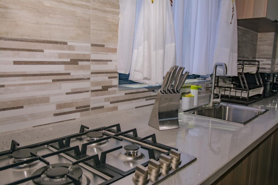 Kitchen or kitchenette, stove