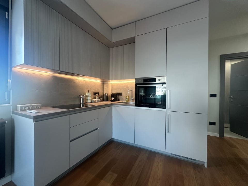 Kitchen or kitchenette, dishwasher, oven, stove, toaster