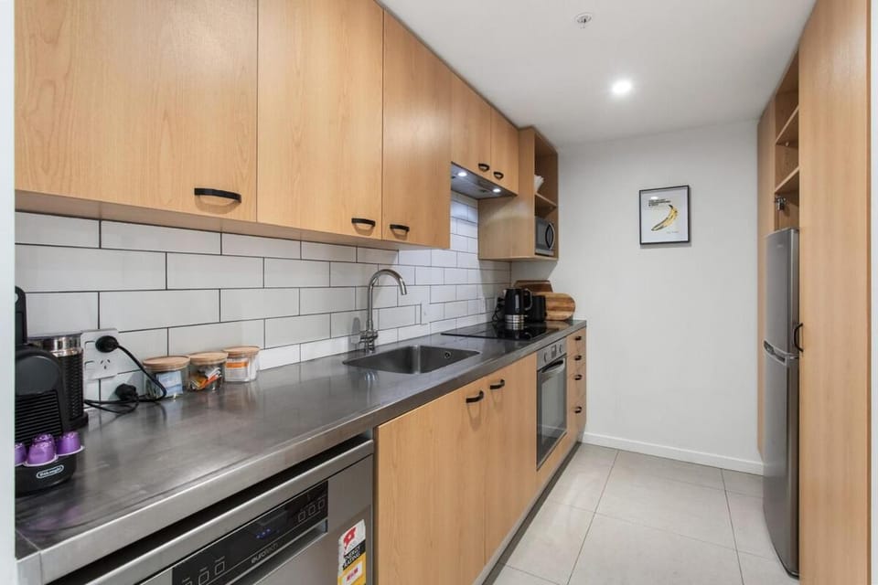Kitchen or kitchenette, dishwasher, oven, stove, toaster