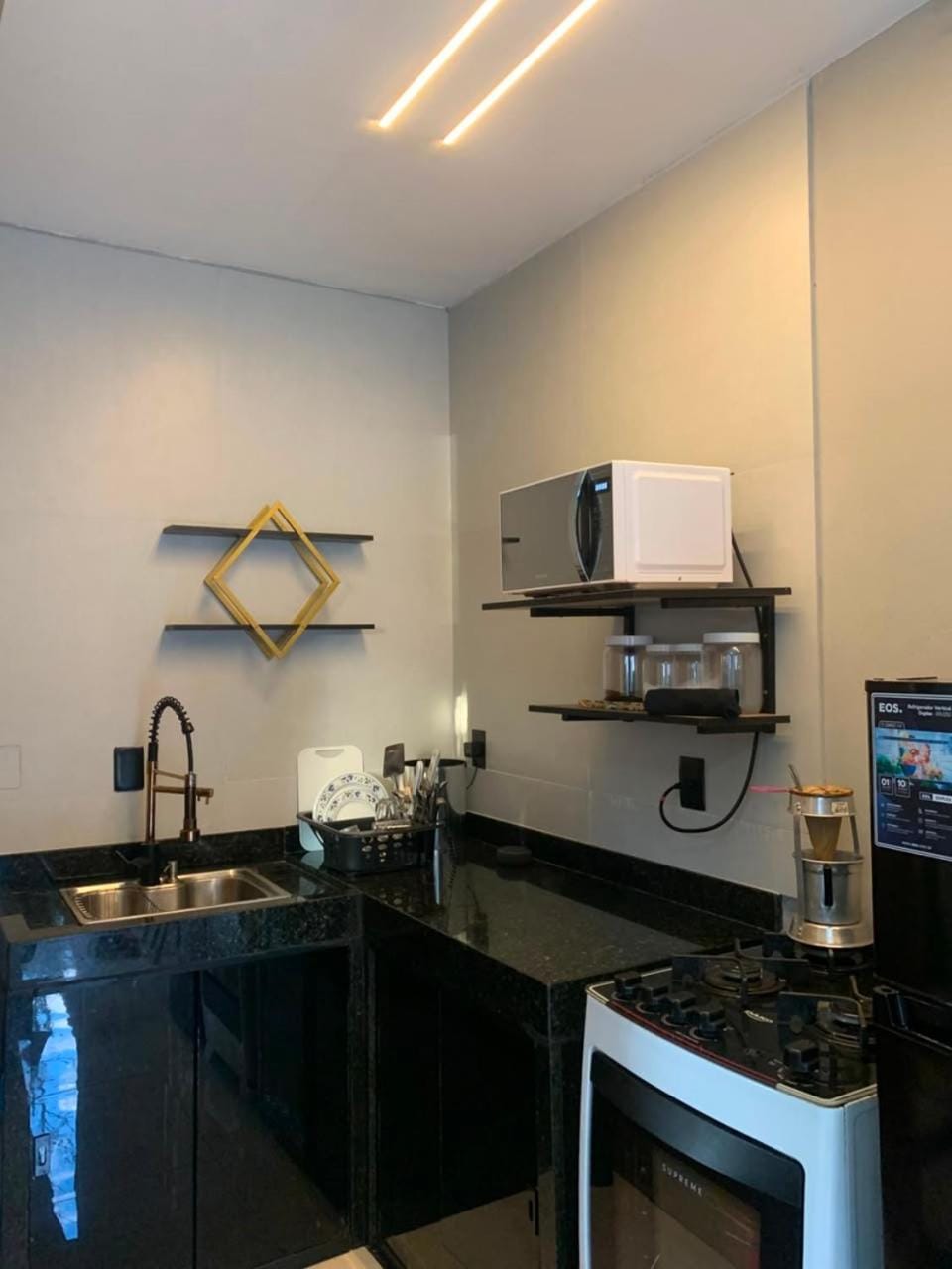 Kitchen or kitchenette, stove