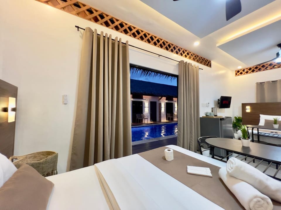 Bed, Pool view, Swimming pool, towels