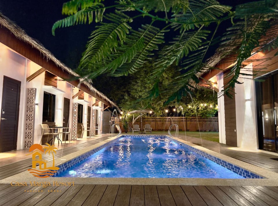 Property building, Night, Pool view, Swimming pool