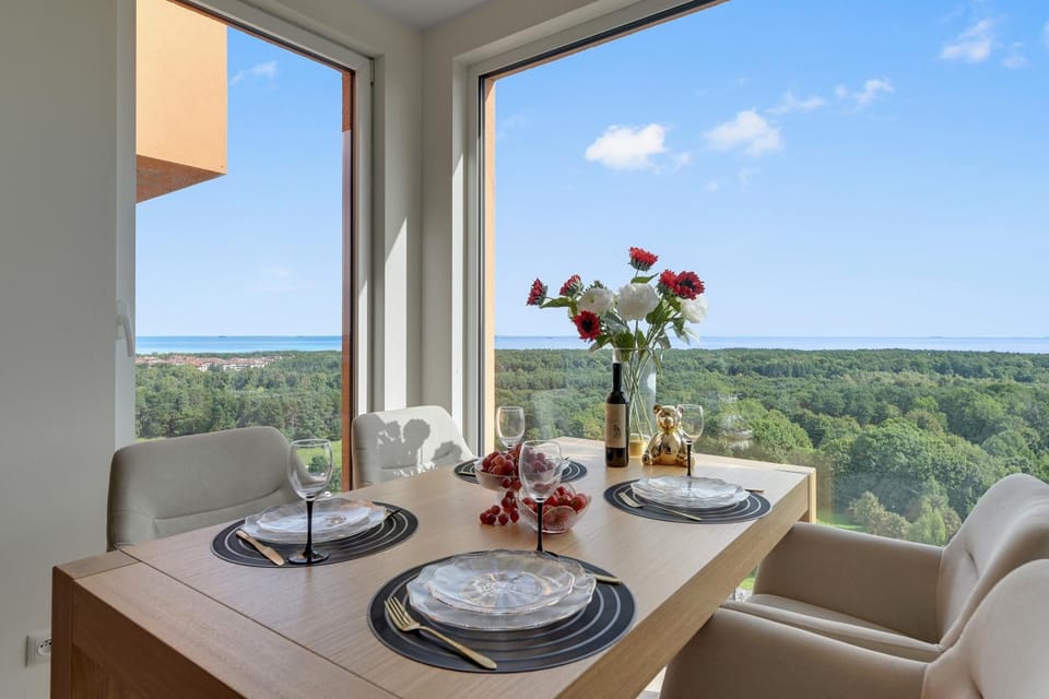Day, View (from property/room), Living room, Seating area, Dining area, Sea view
