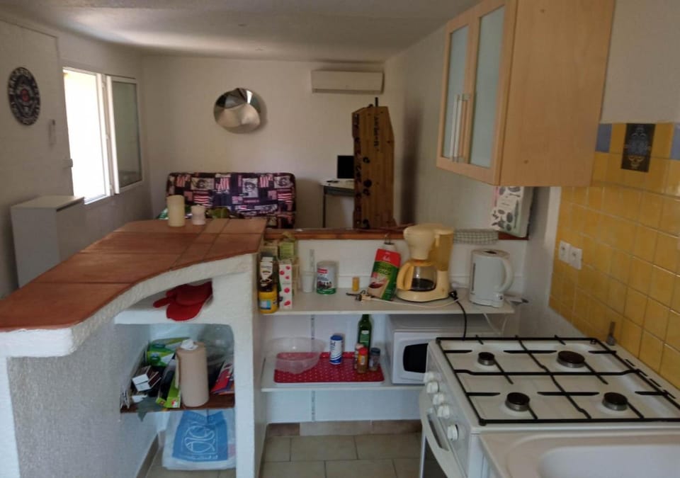 Kitchen or kitchenette, stove