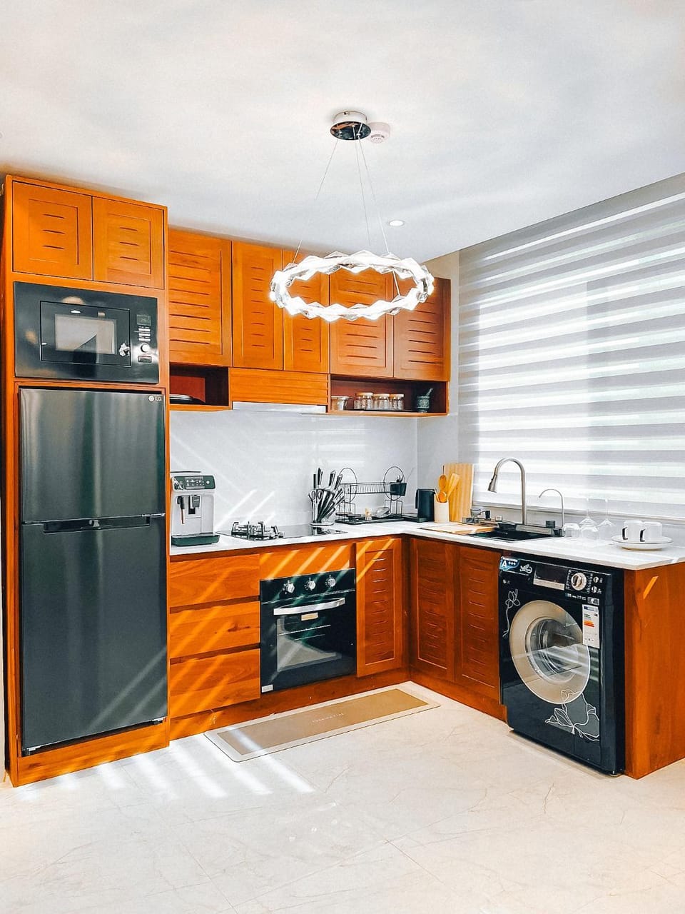 Kitchen or kitchenette, oven, stove, washing machine, dryer