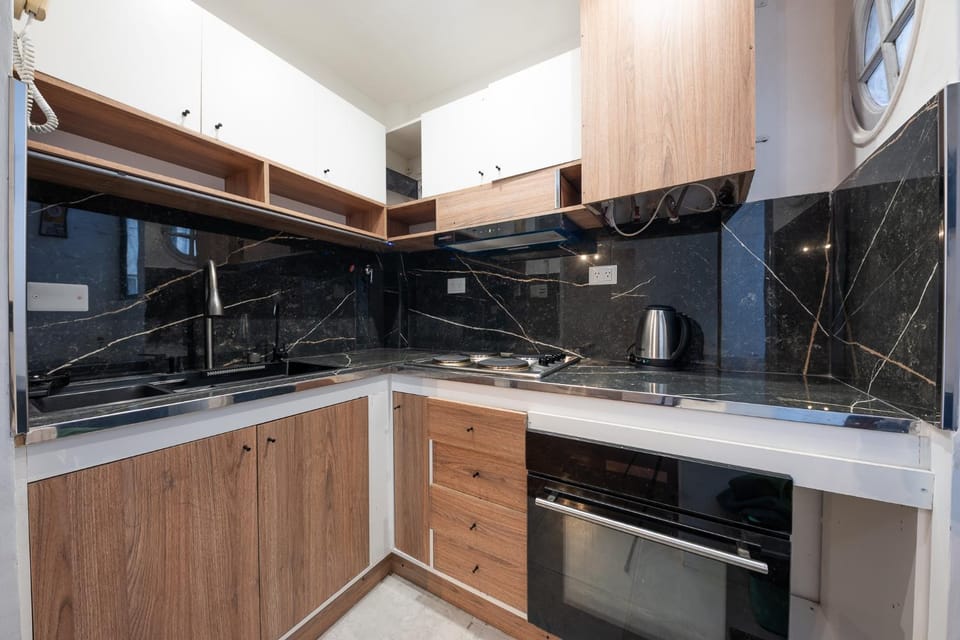 Kitchen or kitchenette, stove