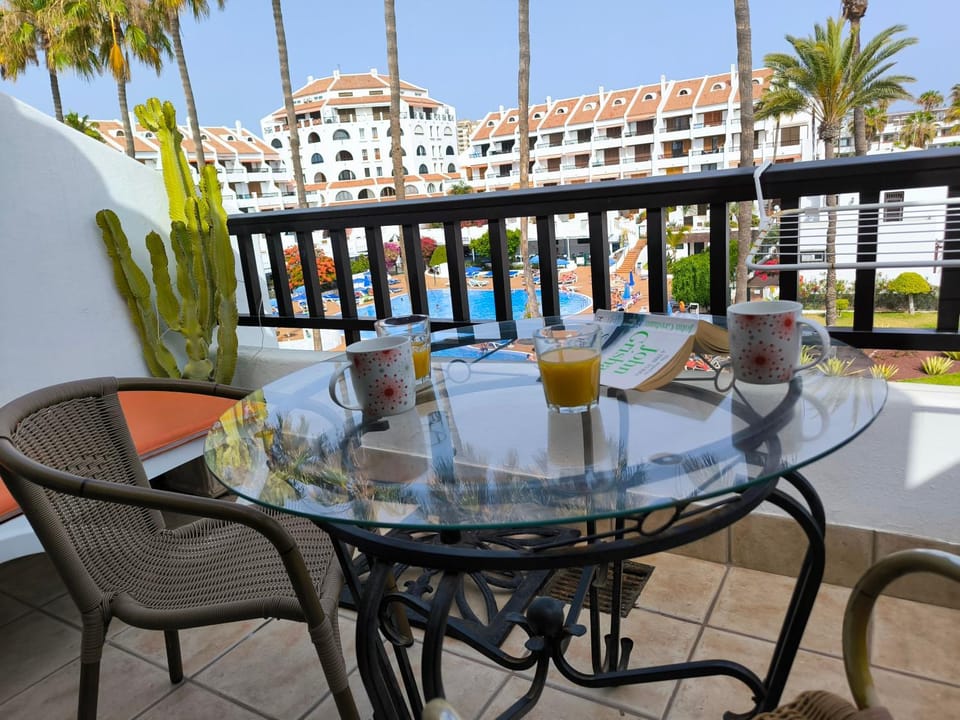 View (from property/room), Balcony/Terrace, Dining area, Pool view, Swimming pool