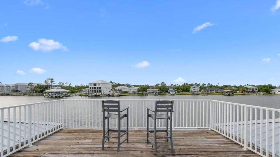 Dreamy Accessible Family Home for 12 with Elevator Access Balcony Fire Pit Community Pool Boat Dock House in Orange Beach