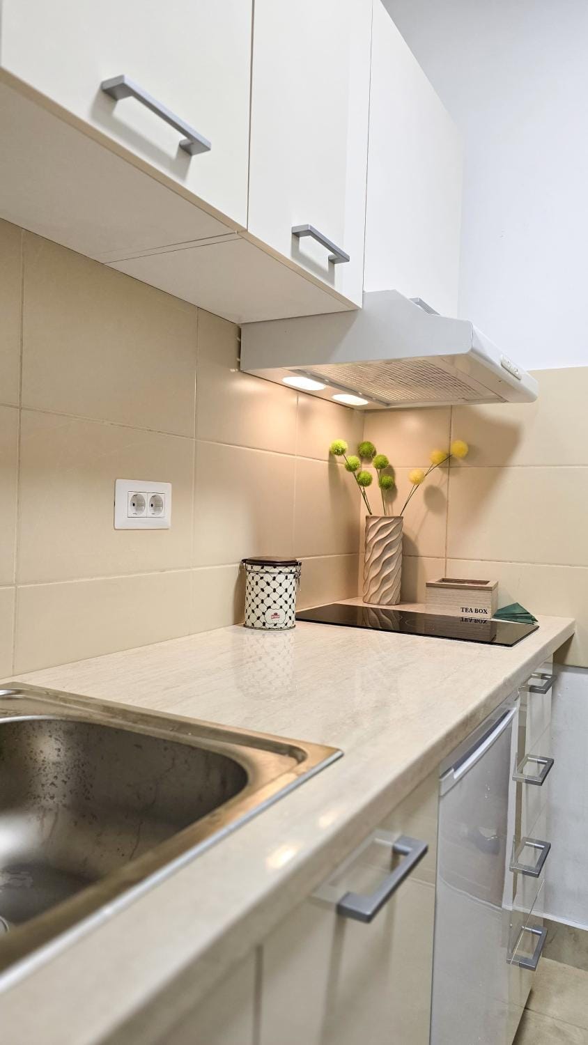 Kitchen or kitchenette, stove