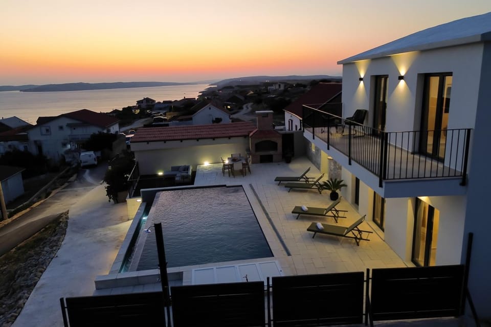 Property building, Patio, Day, Natural landscape, View (from property/room), Balcony/Terrace, Pool view, Sea view, Swimming pool, Sunrise, Sunset, sunbed