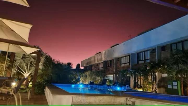 Property building, Night, Pool view, Swimming pool