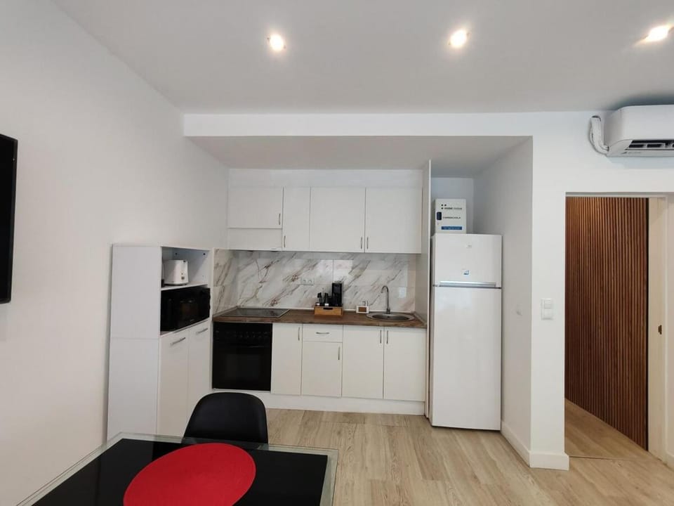 Kitchen or kitchenette, oven, stove
