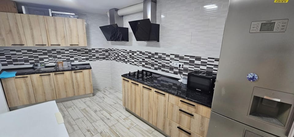 Kitchen or kitchenette, stove