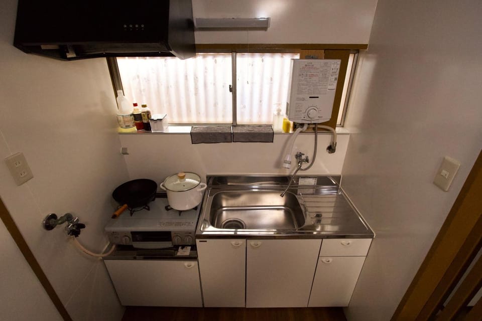 Kitchen or kitchenette, stove