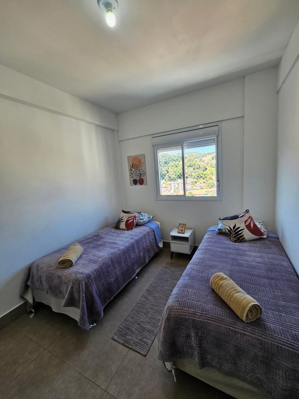 Apto no centro com garagem faça tudo a pé, roupa de cama, banho e aceita pet Apartment in Serra Negra