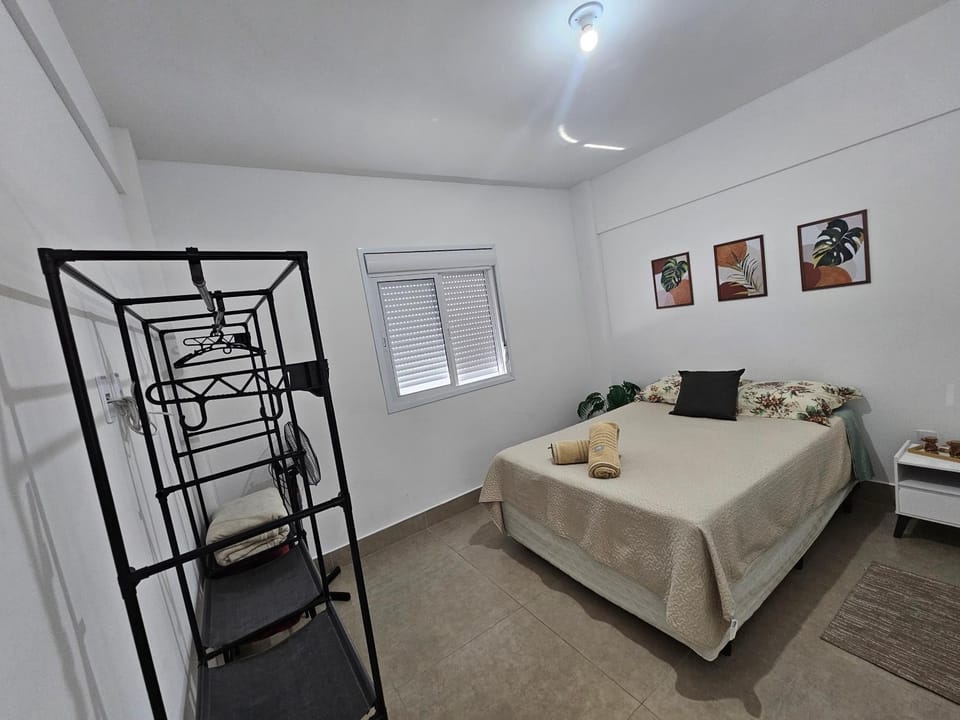 Apto no centro com garagem faça tudo a pé, roupa de cama, banho e aceita pet Apartment in Serra Negra