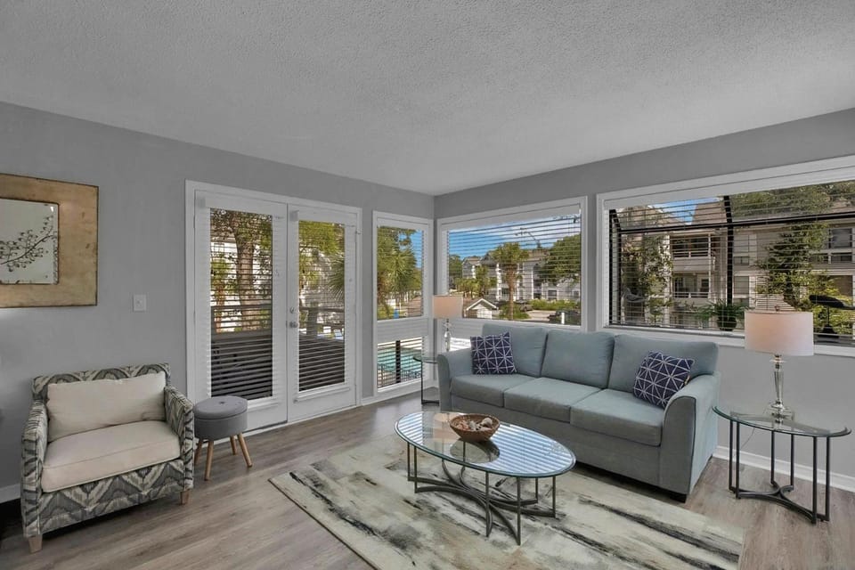View (from property/room), Living room, Seating area, Pool view