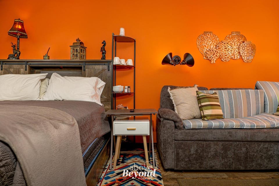 Bed, Living room, Seating area, Bedroom
