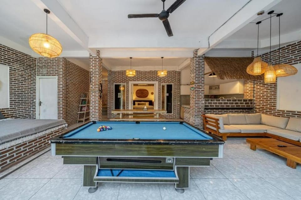 Billiard, Billiard, Living room, Seating area, Pool view, Swimming pool